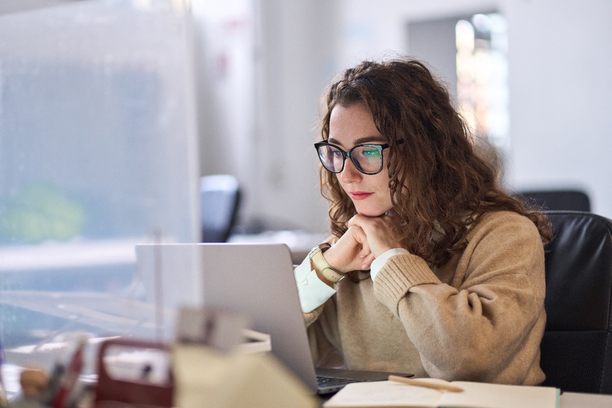 image of someone looking at laptop